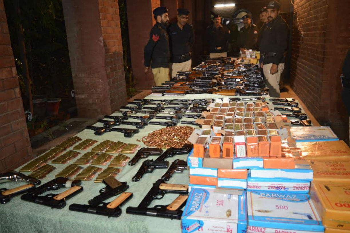 
Punjab Police in late 2016 in Lahore display some of the weapons and explosives recovered from militants and other criminals that year during intelligence-based operations (IBOs) throughout the province. Security forces carried out more than 11,000 IBOs in Punjab in 2016. [Photo courtesy of Javed Mahmood]        
