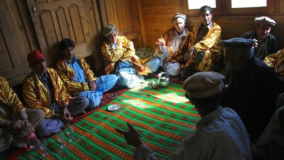 Kalash men discuss various topics. [Alamgir Khan]