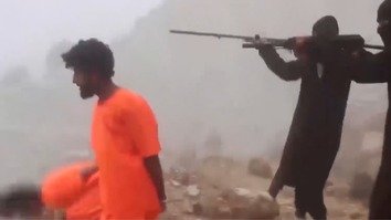 A screenshot from an ISIS video released March 4 shows ISIS terrorists gunning down defenceless civilians.