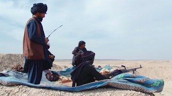 A video screenshot shows Sangorian fighters February 21, positioned in the Aab Pashak area of Gereshk District, Helmand Province.