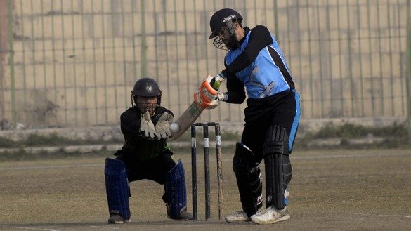 A batsman stops a ball in Peshawar December 5. [Shahbaz Butt]