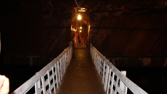 A bridge is shown inside the Khewra Salt Mine July 7. [Syed Abdul Basit]