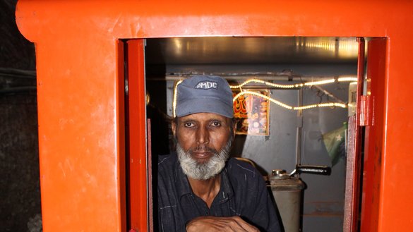 A train operator inside the Khewra Salt Mine waits for visitors July 7. [Syed Abdul Basit]