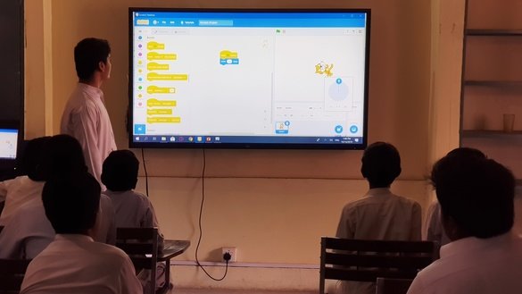 A student presents his project, a game titled "Cat Run", to his class on November 13 at Government Shaheed Shahzad Ijaz High School Peshawar. [Danish Yousafzai]