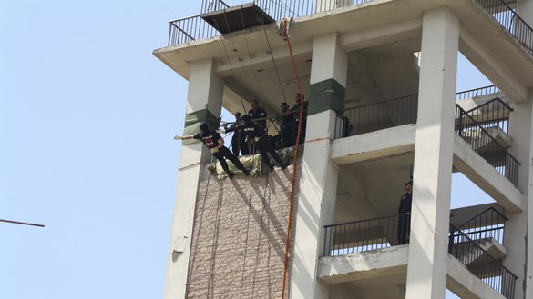 Commandos in Nowshera receive training on how to rappel from a multi-storey building in October. [Javed Khan]