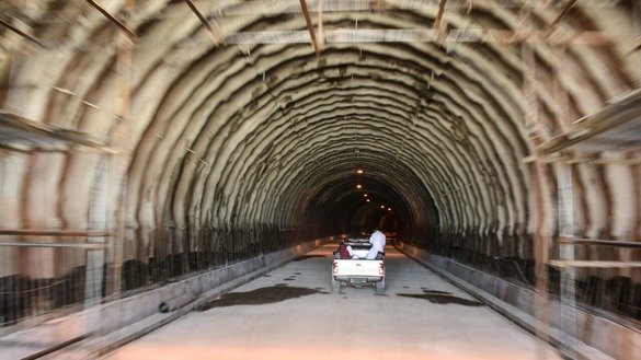 A car passes through the under-construction Nahakki Tunnel in 2016. [Alamgir Khan]
