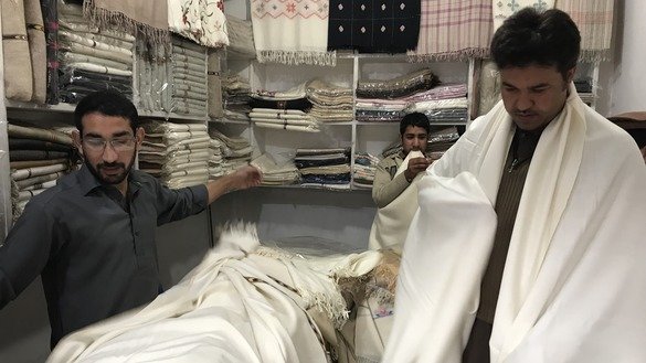 Besides making shawls for women, the artisans in Islampur make chaddars for men. Many tourists like these special shawls for men, vendors say. [Danish Yousafzai]