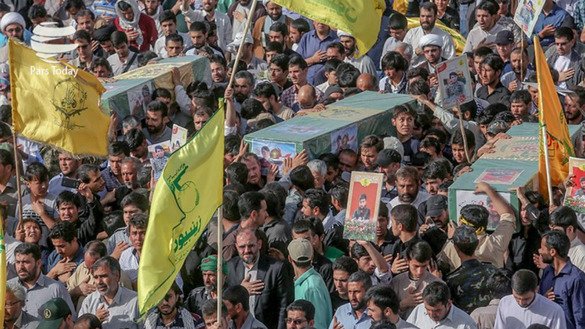 This photo circulated on social media shows a funeral procession in Iran for Shia militia members killed in Syria. The flag of the IRGC-backed Zainabiyoun Brigade, which is made up of Pakistani Shia, is in the foreground.