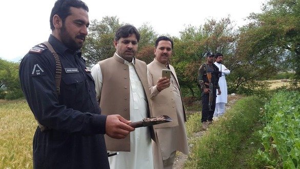 Mohmand Agency political administration officials inspect opium seized during a poppy destruction operation April 21. [Political Administration Mohmand Agency]