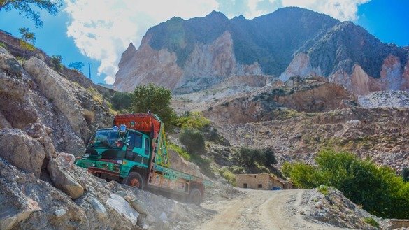 An empty truck heads out to load marble from a mountain in May in Mohmand Agency. [Alamgir Khan]
