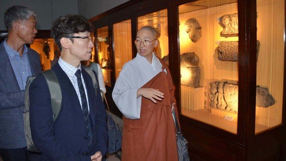 Members of an expedition team of South Koreans comprised of Buddhist pilgrims, researchers and diplomats visit different sections of the Peshawar Museum during their four-day tour of KP. [Adeel Saeed]