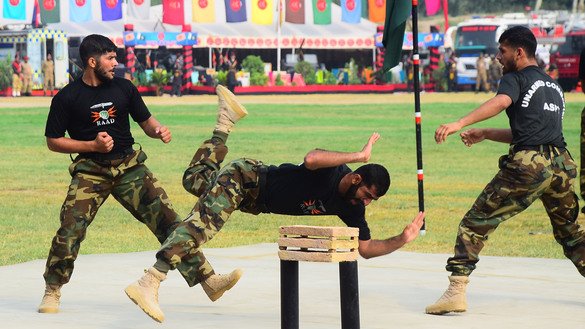 Army personnel exhibit martial arts skills in Peshawar September 6. [Shahbaz Butt]