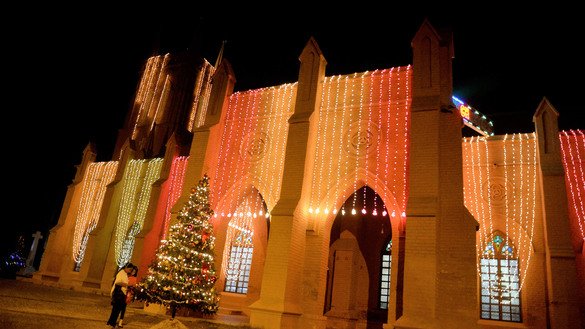 St. John's Cathedral in Peshawar is shown adorned in Christmas lights. [Shahbaz Butt]