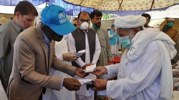 Authorities Distribute Cash Payments To Afghan Refugees Affected By ...