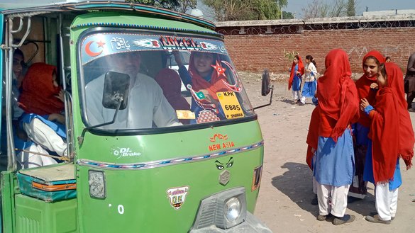 Arab Shah makes several round trips daily to bring the girls to and from school. [Adeel Saeed]