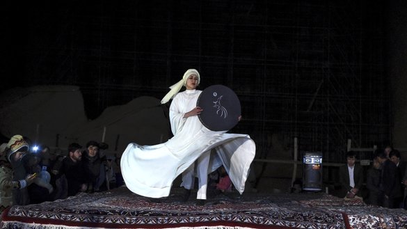 A dancer March 9 performs near the site where the Buddhas of Bamiyan once stood, during a ceremony marking the 20th anniversary of their destruction. [Wakil Kohsar/AFP]