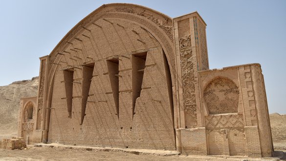 An arch of the historic fortress of Qala-e-Bost is seen in Bost on the outskirts of Lashkargah, Helmand province, on March 27. [Wakil Kohsar/AFP]